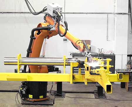 промышленные роботы-манипуляторы на заводе
